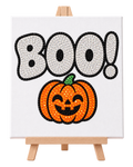 Finished BOO Pumpkin rhinestone canvas displayed on a wooden easel