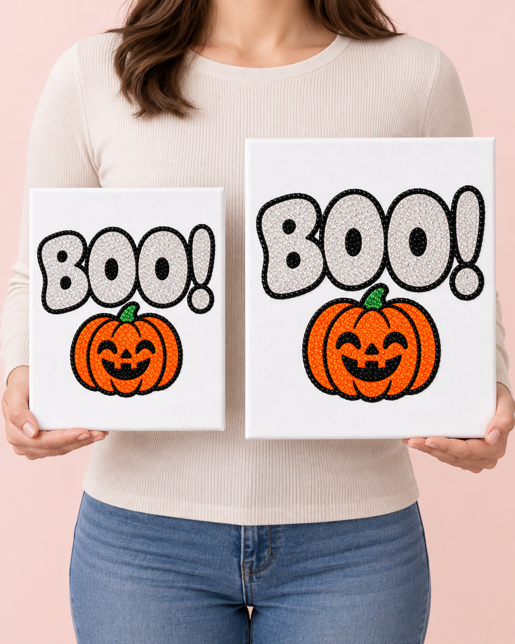Standard 8 by 10 and Large 11 by 14 BOO Pumpkin canvases held side by side