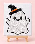 Finished Little Witch Ghost rhinestone canvas displayed on a wooden easel