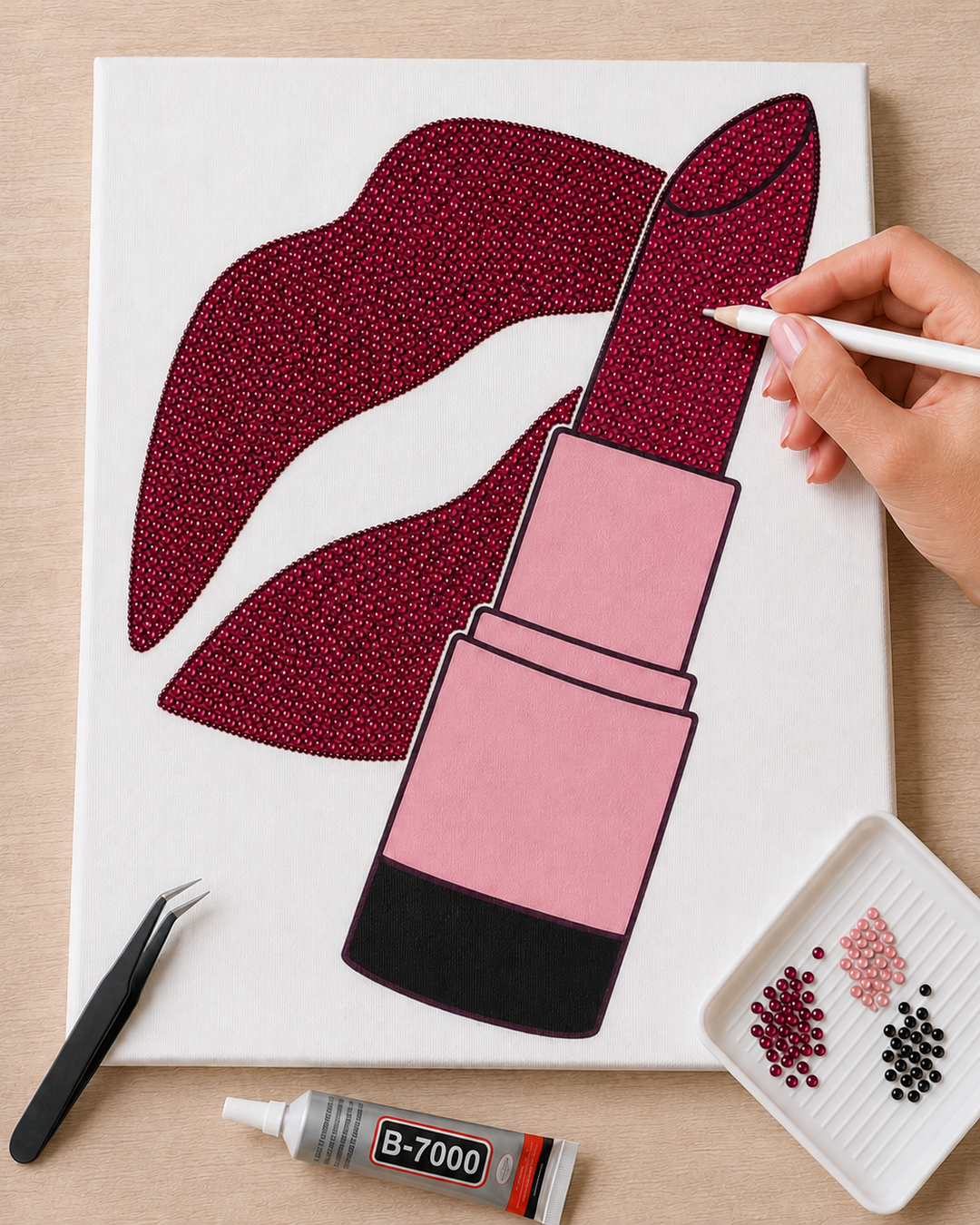 Lip Service canvas in progress with raspberry red rhinestones and the included tools