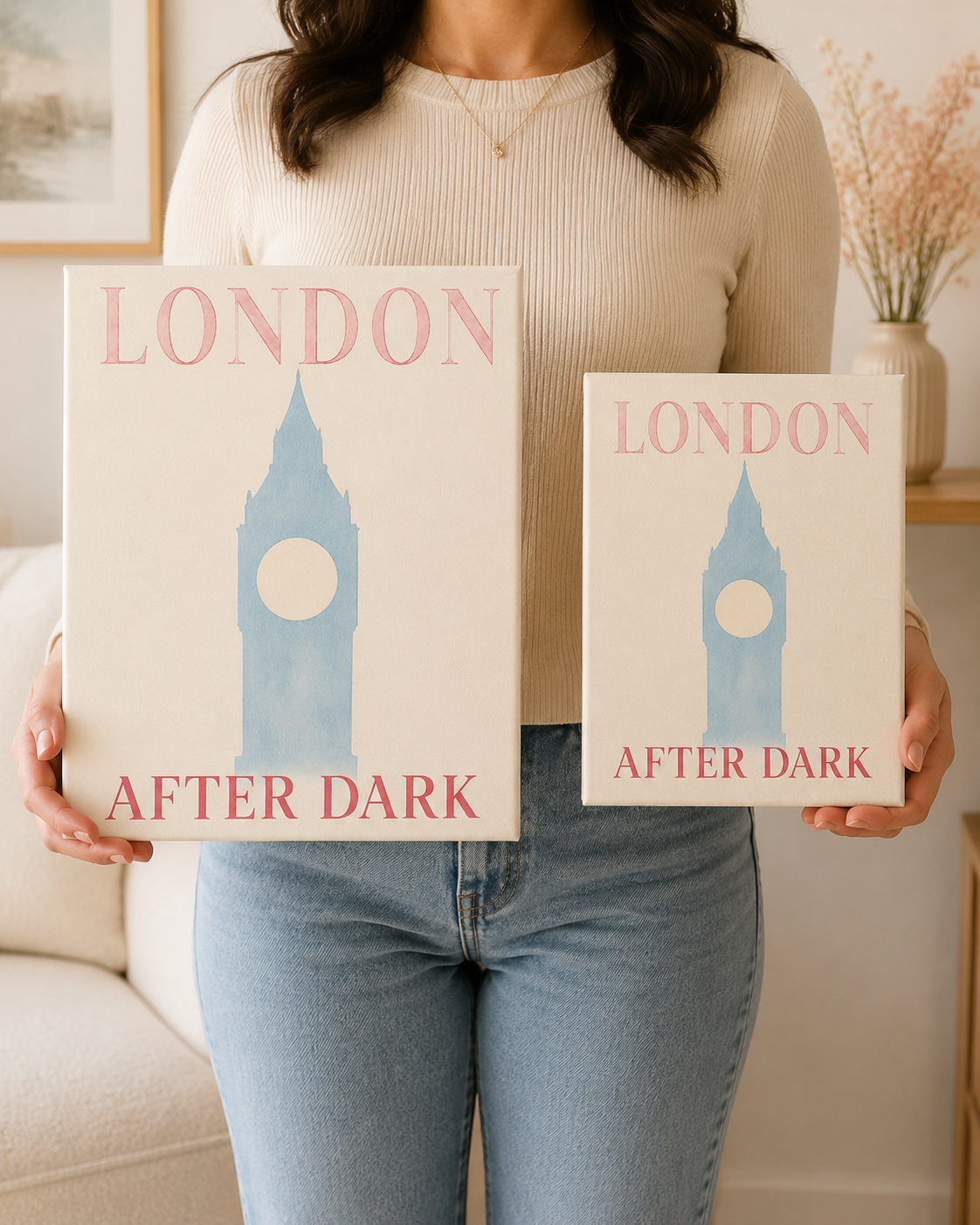 Woman holding Standard 8 x 10 and Large 11 x 14 London canvases