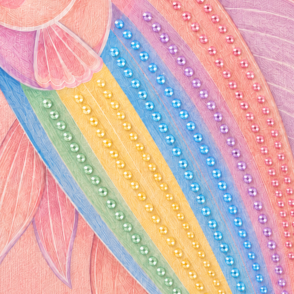 Close up of pastel rainbow fish rhinestone rows on canvas