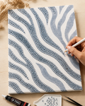 Zebra Print DIY bedazzle canvas being decorated by hand
